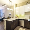 a kitchen with white cabinets