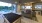 a room with a pool table and tv