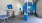 a pet grooming room with tables and chairs